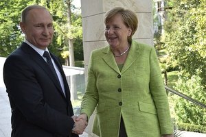 Путин обсудил с Меркель основные вопросы G20