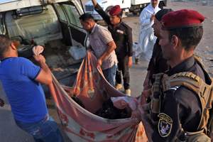 Число жертв атаки на ресторан и блокпост в Ираке достигло 74