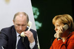 Меркель требует от Путина сесть за стол переговоров с новым украинским правительством