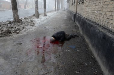 Боль и ужас в Донецке: трагедия в кадрах (18+)