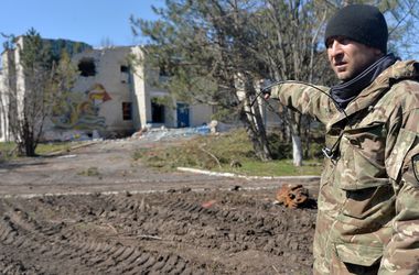 Подорвавшийся на растяжке журналист, работы на месте крушения "Боинга", Пасха в Донецке – фотоитоги недели на Донбассе
