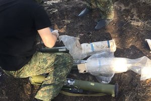 На Донбассе после лесного пожара нашли схрон с гранатометами