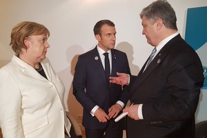 Порошенко, Меркель и Макрон обсуждают в Париже фейковые выборы на Донбассе
