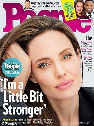 443ba7ad00000578-4880676-lovely_lady_angelina_jolie_graced_the_new_cover_of_people_where_-a-1_1505316468914