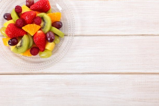 mixed-fresh-fruits-on-a-wooden-table_1147-58