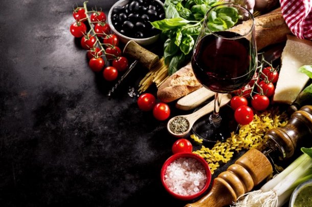 tasty-fresh-appetizing-italian-food-ingredients-on-dark-background_1220-1741